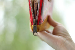 Detail Reißverschluss einfassen zipper tab rot metallisierter Reißverschluss kork senfgelb Portemonnaie nähen